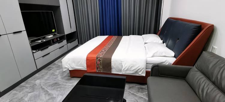 梅河口鑫港圆梦公寓图片