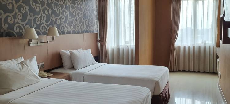 兹姆布勒伊特画廊家庭商务旅馆(Galeri Ciumbuleuit Family & Business Hotel)图片