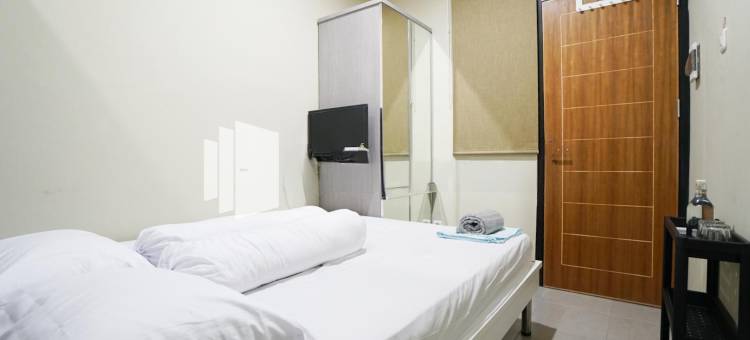 托芒格隆旅馆沙里亚红伙伴酒店(Tomang Gelong Guest House Syariah Mitra RedDoorz)图片