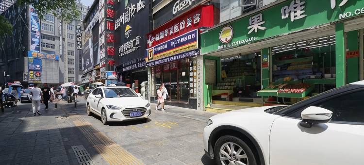 华美商务酒店(株洲火车站服装市场店)图片