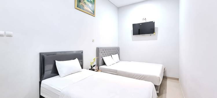卡里斯玛努山塔拉萨甘米特拉红门酒店(Kharisma Nusantara Homestay Sagan Mitra RedDoorz)图片