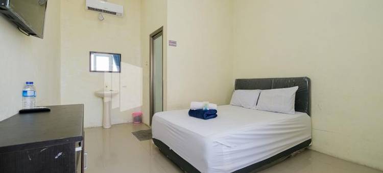 格兰德肯卡纳沙里亚旅馆尼尔威萨塔巴哈里拉蒙甘-红门酒店Mitra(Grand Kencana Guesthouse Syariah Near Wisata Bahari Lamongan)图片