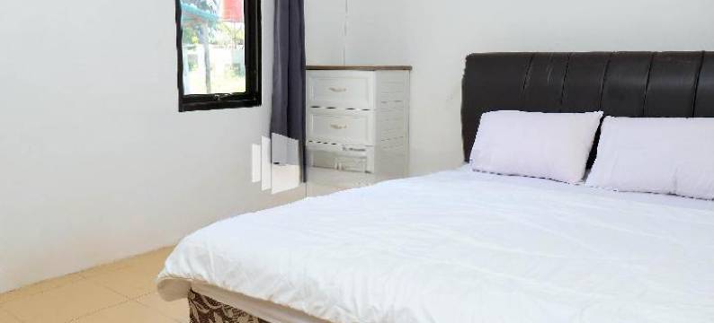 沙哈巴特海滩宾馆 - 米特拉红门酒店(Sahabat Pantai Guest House Mitra RedDoorz)图片