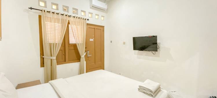 玛拉卡卡图古日惹美特拉红门酒店(Hotel Maerakaca Tugu Yogyakarta Mitra RedDoorz)图片