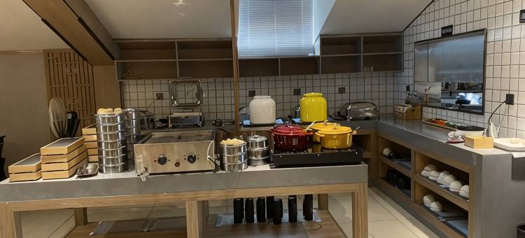 万纳轻雅酒店(涟钢沃尔玛五江建材店)图片
