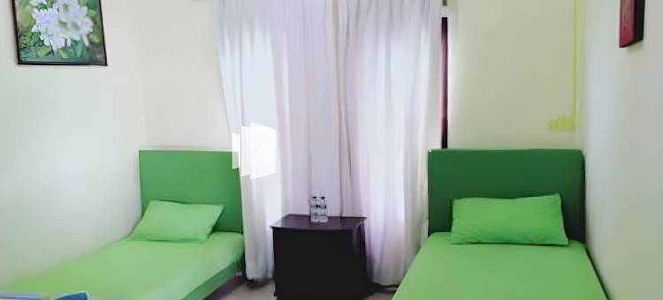 夸特里克迪民宿米特拉红门酒店(Quattrick Dee Homestay Mitra RedDoorz)图片