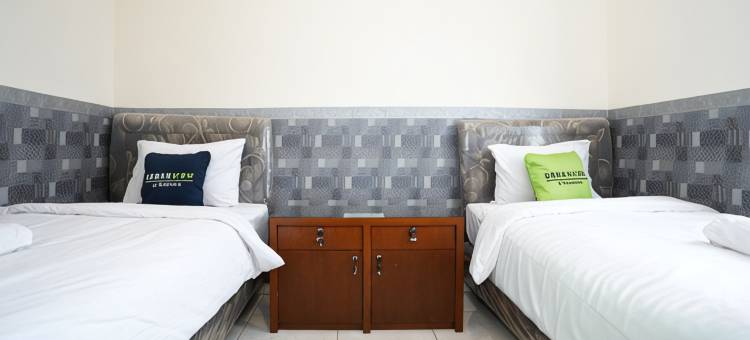 Urbanview Hotel Syariah Griya Asri Patran Near Tugu Station图片
