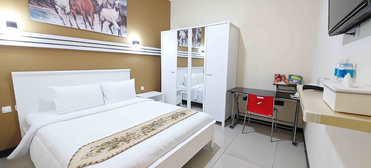 龙市酒店 - 近三邦利马三宝垄 - 美特拉酒店(Rons City Hotel Near Simpang Lima Semarang Mitra RedDoorz)图片