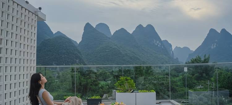 百香果HOTEL民宿(遇龙河景区骥马码头店)图片