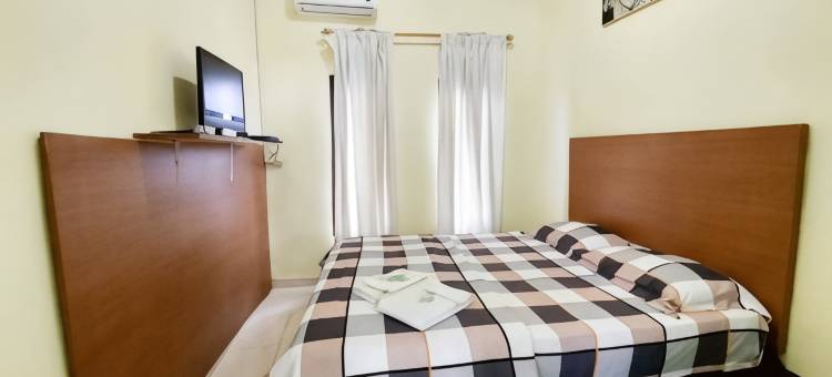 夸特里克迪民宿米特拉红门酒店(Quattrick Dee Homestay Mitra RedDoorz)图片