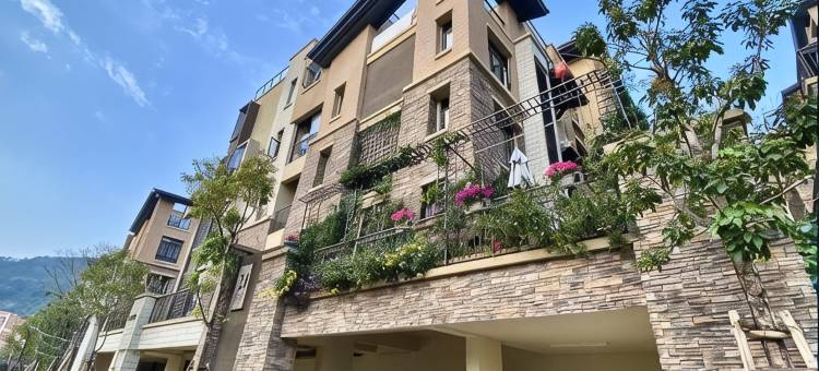 慢与你·设计师影院民宿(广州南方学院保利桃花源店)图片