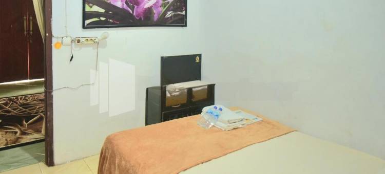 卢马姜红多兹樊塔民宿(RedDoorz @ Fanta Homestay Lumajang)图片