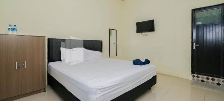 格兰德肯卡纳沙里亚旅馆尼尔威萨塔巴哈里拉蒙甘-红门酒店Mitra(Grand Kencana Guesthouse Syariah Near Wisata Bahari Lamongan)图片