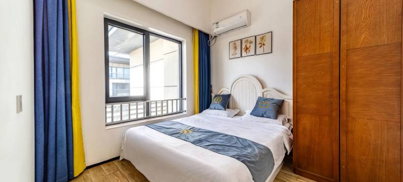 怀瑾握瑜蔚蓝海岸顶层观海洋房民宿(华贸一路1号分店)图片