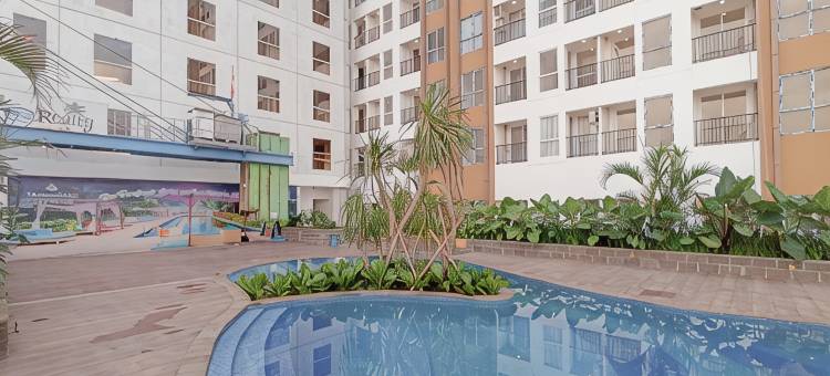Grey Toned 1BR Apartment Tamansari Skylounge Makassar By Travelio图片