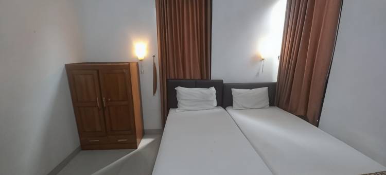 Capital O 93872 Natura宾馆伊斯兰教近普禾加多市中心广场(Capital O 93872 Natura Guest House Syariah Near alun alun kota purwokerto)图片