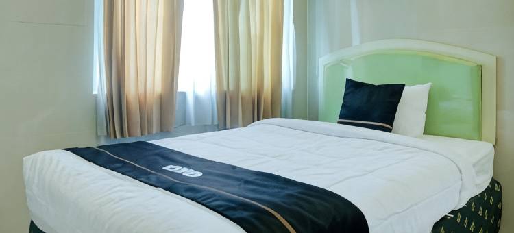 橡树镇帕伦邦酒店靠近安培拉大桥原阿祖拉酒店(Townhouse Oak Palembang Near Jembatan Ampera Formerly Azzura Hotel)图片