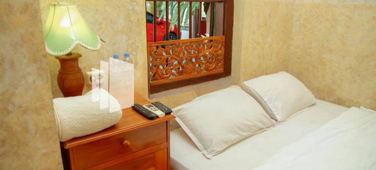 Flamboyan Asri Syariah Mitra RedDoorz Near Kampung Inggris Pare图片