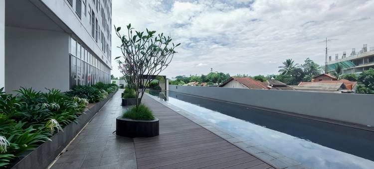 Studio Apartment Near Cisauk Station at Serpong Garden By Travelio图片