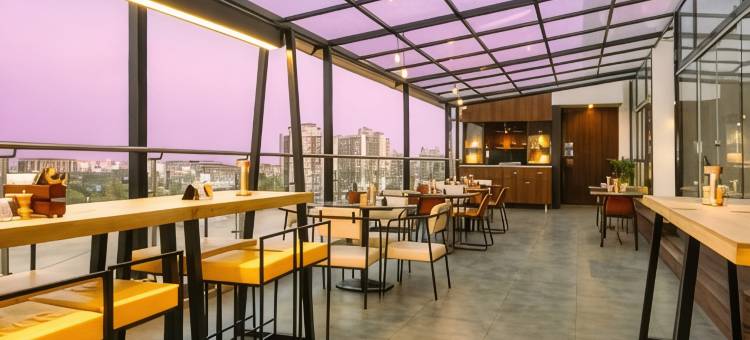 拉杰克特马拉萨萨罗瓦尔门廊酒店(Marasa Sarovar Portico  Rajkot)图片