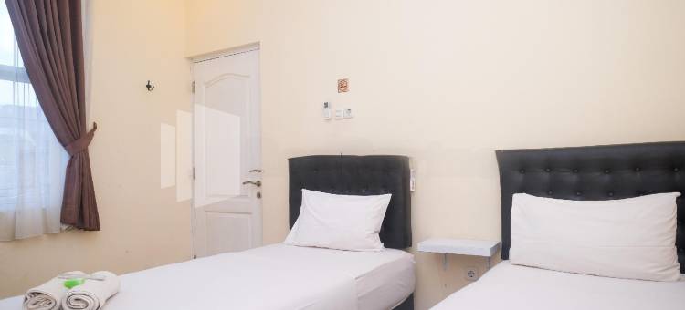 格里亚洛卡2沙里亚尼尔辛邦利马米特拉瑞德多兹(Griya Loka 2 Syariah Near Simpang Lima Mitra Reddoorz)图片