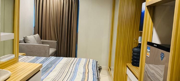 RedLiving格兰德卡马拉泻湖公寓 by Ownr Room(RedLiving Apartemen Grand Kamala Lagoon by Ownr Room)图片