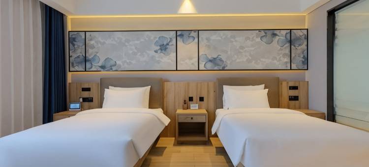 赤峰龙致逸景酒店(维多利摩尔城红山区政府店)图片