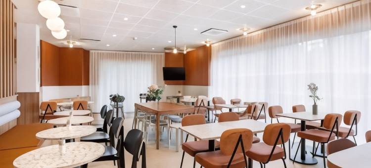 里昂东梅济约厄科尔斯博体育场基里亚德酒店(Kyriad Lyon Est - Stadium - Eurexpo)图片
