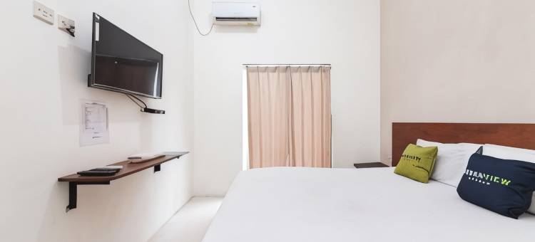 瑞德多兹酒店 - 近班贾尔马辛佳兰艾哈迈德沙亚尼(Urbanview Hotel Ava Banjarmasin by RedDoorz)图片