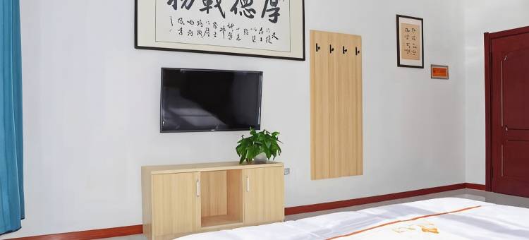 馨洋宾馆(乌兰察布维多利集宁南火车站店)图片