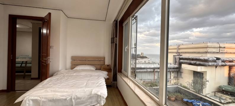 海景房程姐公寓(东山路分店)图片