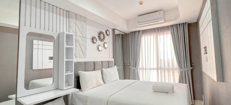 Grey Toned 1BR Apartment Tamansari Skylounge Makassar By Travelio图片