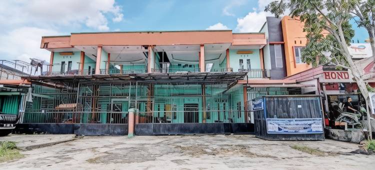 Hotel O 彭吉纳潘沙菲拉酒店，靠近穆斯塔明多柏迈1号住宅区(Hotel O Penginapan Syafira Near Perumahan Mustamindo Permai 1)图片