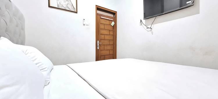 卡里斯玛努山塔拉萨甘米特拉红门酒店(Kharisma Nusantara Homestay Sagan Mitra RedDoorz)图片