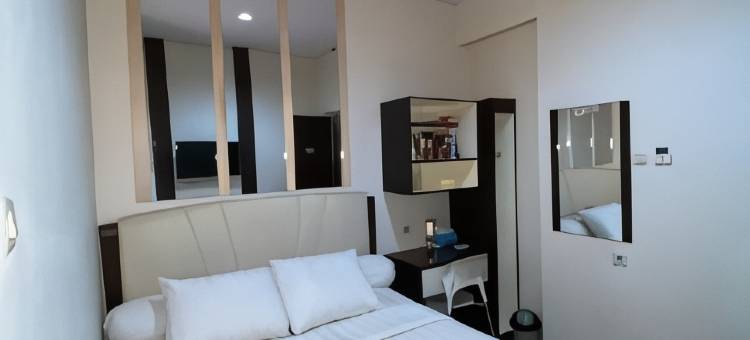 位于茉莉芬的4卧室-600平方米|带1个独立浴室(De Kost Madiun)图片