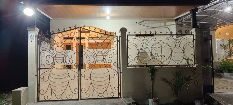 红色伙伴比鲁民宿酒店(Maulana Homestay - by Login)图片