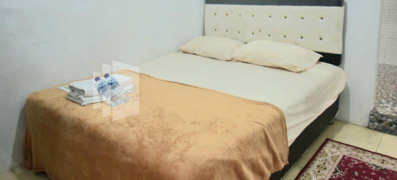 卢马姜红多兹樊塔民宿(RedDoorz @ Fanta Homestay Lumajang)图片