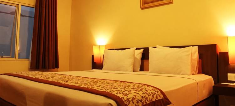 萨罗兰冈特里塔玛住宿阿巴迪酒店(Abadi Hotel Sarolangun)图片