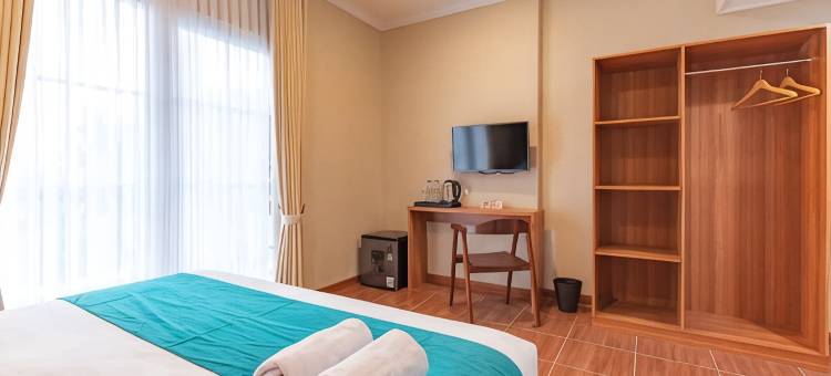 桑斯维布斯苏拉帕西孔福塔酒店(Sans Vibes Surapati Konforta Hotel)图片