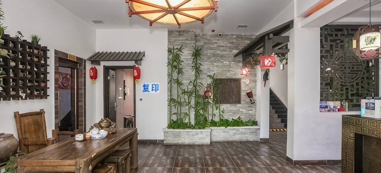 哈尔滨钱柜时尚宾馆(黑龙江中医药大学附属第一医院店)图片