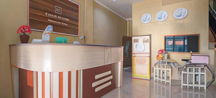 红多兹Plus酒店-近沙姆斯丁努尔机场3号(RedDoorz Plus Near Syamsudin Noor Airport 3)图片