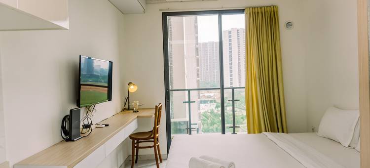 Well Furnished and Comfy Studio Sky House BSD Apartment By Travelio图片