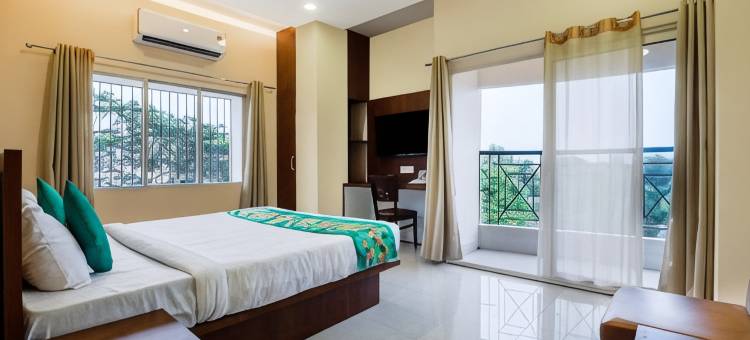 Treebo Urban Oasis Inn, Sixmile图片