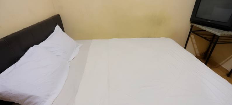 O乐威家庭宾馆-靠近GBKP邦温穆利亚11公里(Hotel O Lewi Family Guest House Near Gbkp Bangun Mulia Km. 11)图片