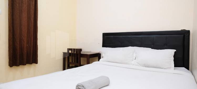 马斯克利米斯宾馆帕库翁商场米特拉红门酒店(Mas Klimis Guesthouse Pakuwon Mall Mitra RedDoorz)图片