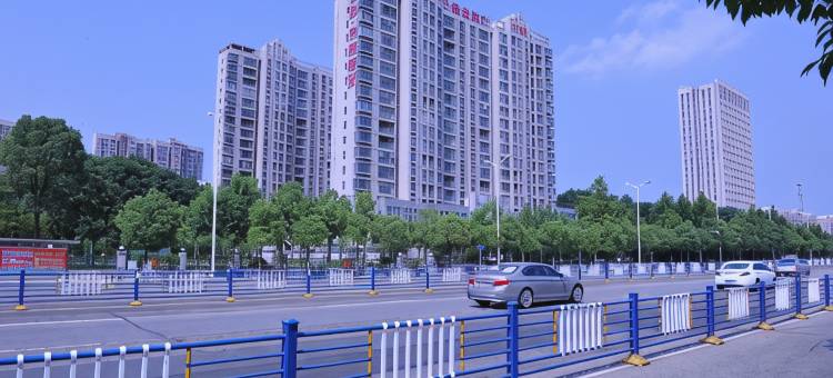 信阳蘭酒店(市政府羊山外国语小学店)图片