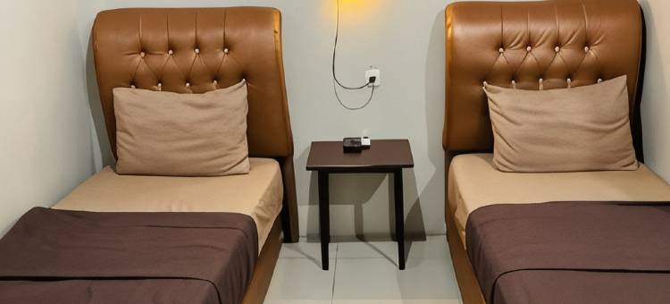 位于Tungkal Iv Kota的2卧室-800平方米|带1个独立浴室(Family Hotel Kuala Tungkal)图片