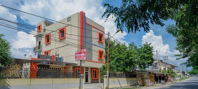 红多兹酒店-近帕卢千禧水上乐园(RedDoorz Near Millenium Waterpark Palu)图片