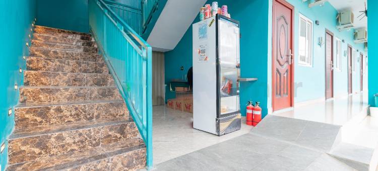 希瓦家园沙利亚红伙伴靠近阿伦阿伦特加尔(Shiva Home Syariah RedPartner Near Alun Alun Tegal)图片