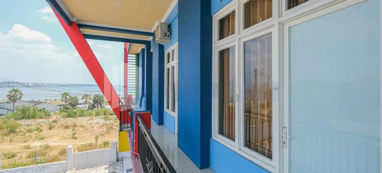 格兰德肯卡纳沙里亚旅馆尼尔威萨塔巴哈里拉蒙甘-红门酒店Mitra(Grand Kencana Guesthouse Syariah Near Wisata Bahari Lamongan)图片